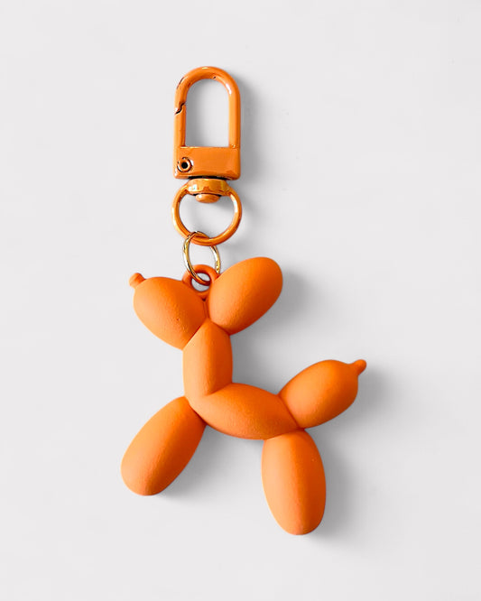 Matte orange balloon dog charm