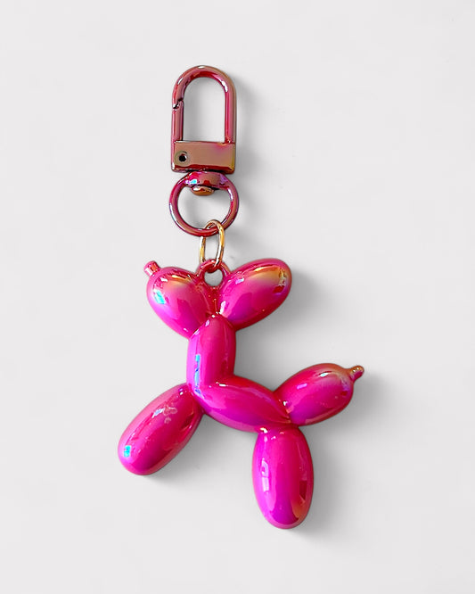 Metallic fushia balloon dog charm